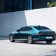 Image for article titled The Genesis 'Electrified G80' Is An All-Wheel-Drive Power Bank Rocking Teal Paint